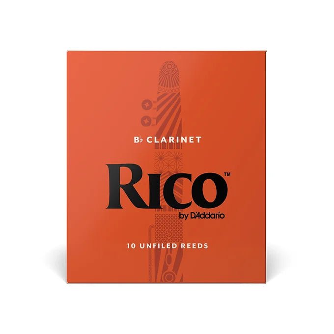 A bright orange Rico Reeds box for Bb clarinets features bold black text and decorative patterns, containing 10 unfiled reeds.