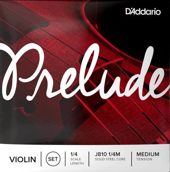 Close-up of D’Addario Prelude Violin String Set Medium Tension packaging, highlighting the bold Prelude script over a red violin body. Features include 1/4 scale length and a solid steel core for medium tension—an ideal option for those seeking dependable student violin strings. Perfectly suited as a D’Addario Prelude Violin String Set.