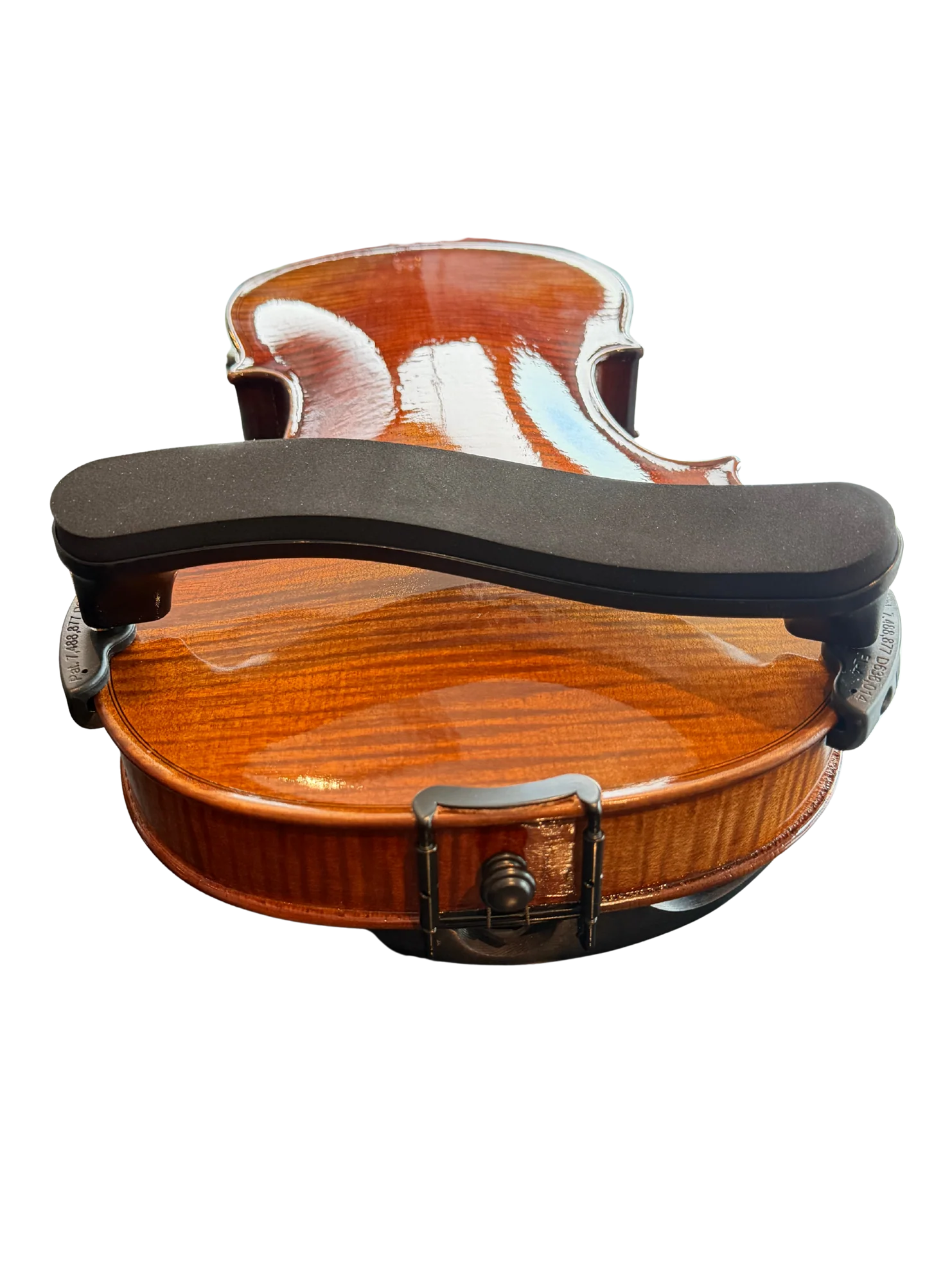 A close-up of the back of a brown violin featuring an Everest Violin Shoulder Rest, photographed against a white background.