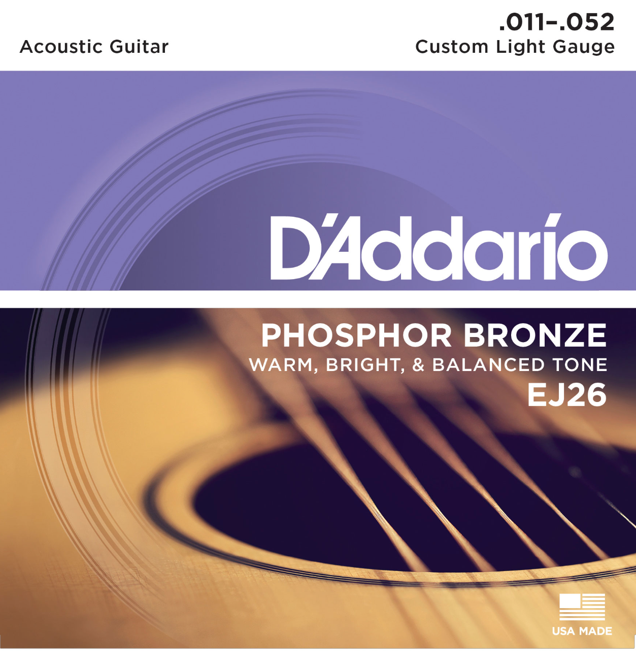 Close-up of an acoustic guitar featuring D’Addario branding, with a focus on D’Addario EJ26 Phosphor Bronze Acoustic Guitar Strings Custom Light (11–52), known for their warm, balanced tone. USA flag icon appears in the lower right corner.